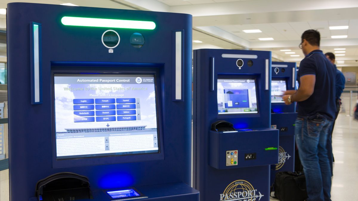 Automated Passport Control kiosks at an airport, the type of self-service kiosk Global Entry members use to clear customs