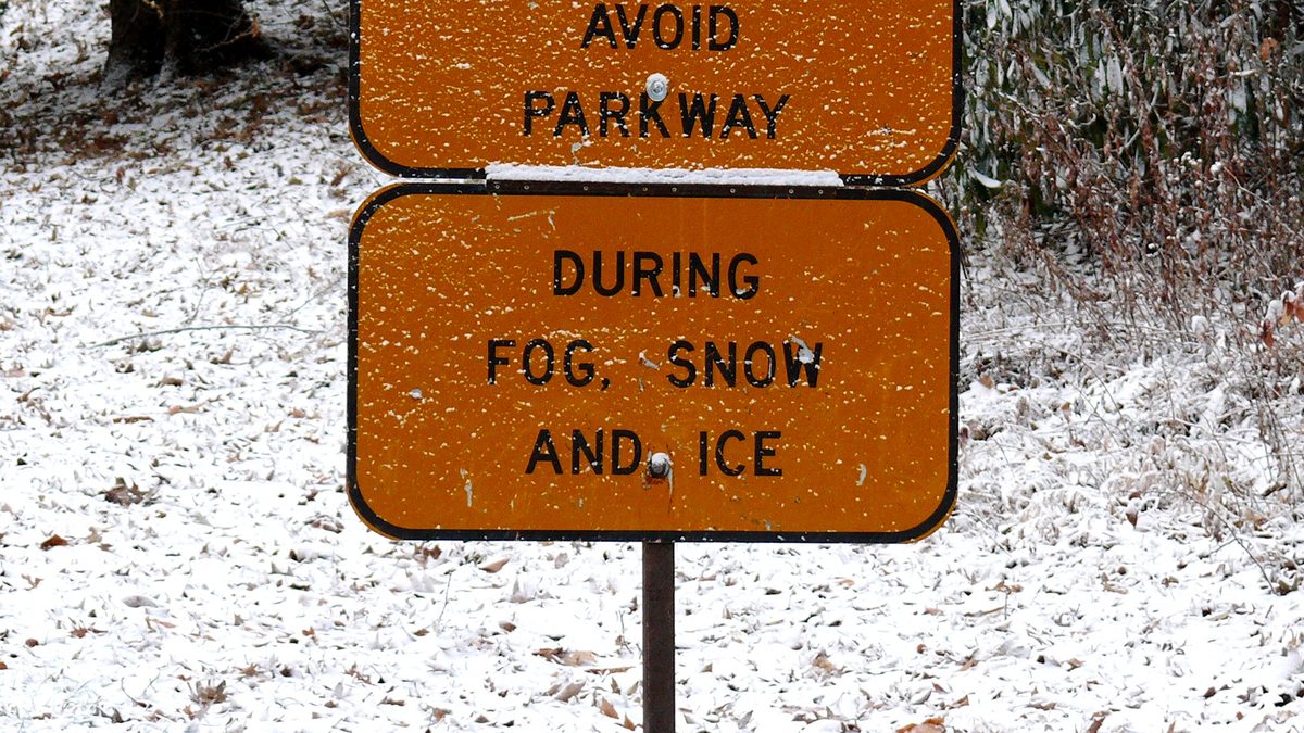 Blue Ridge Parkway sign reading avoid parkway during fog, snow and ice